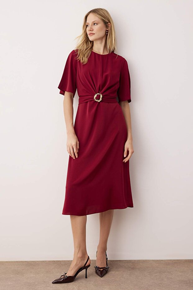 The Buckle Twist Midi Dress